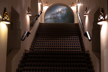 Composition, path, road to heaven. A marble staircase with steps and decorative lanterns smoothly passes into the night sky with the Milky Way.