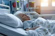 Male patient lying tiredly on hospital bed