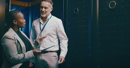 Fototapete - Technician, team and tablet in server room for cloud computing, engineering and engineering advice or solution. Senior manager and woman in data center with digital technology or system gdpr planning