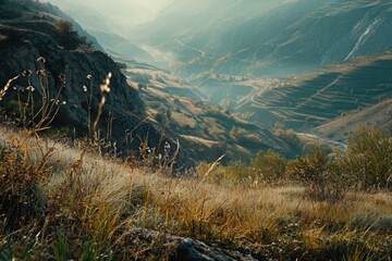 Canvas Print - A picturesque view of a valley with majestic mountains in the background. Ideal for nature-themed designs and travel-related projects