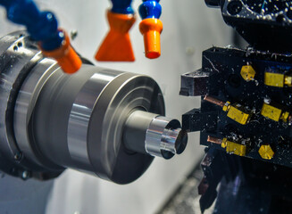 Wall Mural - the multi-tasking cnc lathe machine milling cut the metal part, the hi-technology parts manufacturin