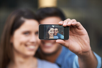 Sticker - Portrait, selfie of happy couple and phone screen, love and care in relationship. Man, woman and profile picture of face on smartphone, memory or photo together on social media on valentines in home