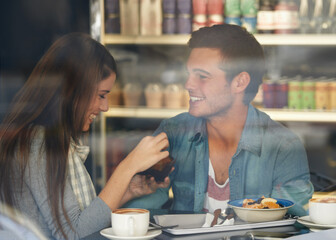 Canvas Print - Food, smile and couple eating in cafe, care and bonding together on valentines day date. Happy, man and woman in restaurant with coffee drink for breakfast, love or relationship conversation in shop