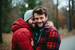 © Galina Perevozova - Two romantic male LGBT gay in love, embracing each other in a park. LGBTQ Lifestyle Concept