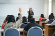 © EduLife Photos - Education, teaching, learning concept. Asian university lecturer teaching lesson to students in classroom