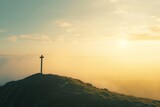 Fototapeta Krajobraz - Serene Cross at Mountain Sunset

