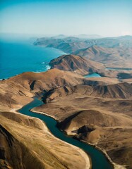 Wall Mural - an aerial view of a lake and some mountains by the ocean
