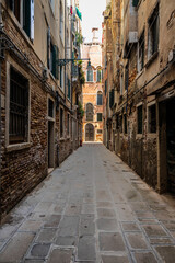 Naklejka na meble Looking down the narrow streets or alley of Venice