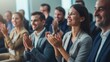 © liliyabatyrova - The company's employees clap their hands as a sign of success, support, and achievements. A team of cheerful smiling multiethnic group of people applauds at a briefing in the office.