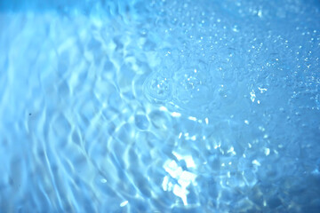 Wall Mural - Blue water texture. Bubbles and bubbling water.