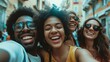 Multiracial selfie with friends walking on city street, young people having fun, teenagers laughing at camera, friendship and tourism concept