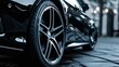 Close up car alloy wheel. side black car background     