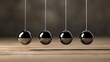 Newton's cradle physics concept for action and reaction or cause and effect. Balls Newton