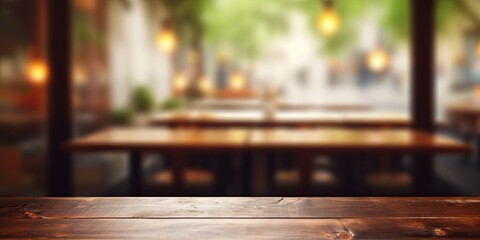 Restaurant banner background with empty wood table and blurred glass window interior - perfect for displaying or showcasing products.