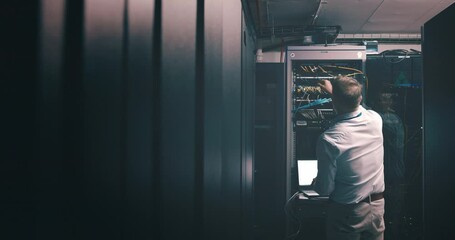 Poster - Man, server room and computer for maintenance, system solution and data center, coding or cybersecurity at night. Back of technician, laptop and engineering of gdpr software, backup or cables check