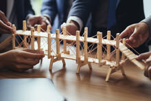 Business Team Building A Bridge Together