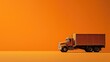 Classic model truck on a vivid orange background