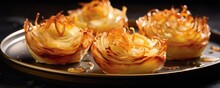 A Stunning Presentation Of Whole Onion Blossoms, Their Crispy And Golden Exteriors Hiding An Enticingly Soft And Sweet Core Beneath Each Layer.