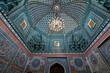 beautiful antique chandelier on the ceiling. ceiling inside the crypt or mausoleum is in the traditional Uzbek style. Beautiful interior of the complex Shah-i-Zinda or Shah i Zinda
