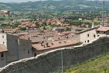 Sticker - Rooftops and landscape of old Italian walled city on mountainside