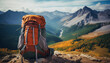 Colorful hikers backpack on green slope. Travel backpack, close up. View on front tourist traveler bag on background mountains and valley in sunny day. Travel outdoor concept. Hiking in the mountains.