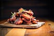 pile of smoked chicken wings on rustic wood