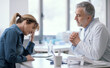 © StockPhotoPro - Doctor giving a bad prognosis to the patient