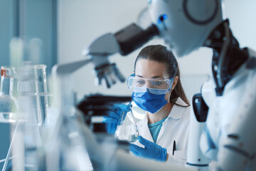 Wall Mural - scientist and humanoid robot working together in the science lab