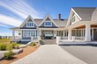 elegant shingle home with white trim and beach access