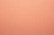 Cute peach color or pale orange tone paint on environmental friendly cardboard box blank paper texture background with space minimal style
