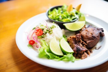 Poster - finished plate of mole with side salad and lime