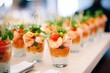 individual shrimp cocktail servings at a catered event