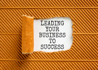Wall Mural - Leading your business to success symbol. Concept words Leading your business to success on beautiful white paper. Beautiful brown paper background. Leading your business to success concept. Copy space