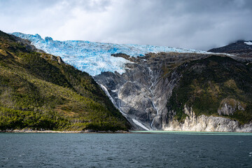 Romanche Glacier with waterfall from the Beagle Channel in the Chilean Fjords, Chile.