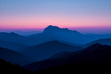 Evening Descends On Majestic Mountains