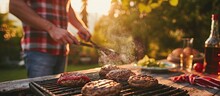 A Man Puts Burger Buns On The Grill Of A Gas Grill A Gas Grill Is Installed In The Backyard Of The Household Interesting Pastime With Family And Friends. Copy Space Image. Place For Adding Text