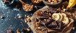 Frozen banana on a stick covered with dark chocolate and crumbs of nuts A quick delicious dessert for kids for a birthday for a candy bar Vegan dessert. Copy space image. Place for adding text