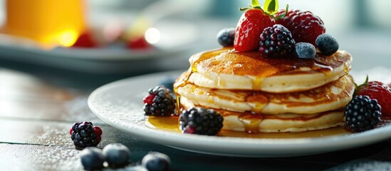 Poster - White plate full of pancakes with strawberries raspberries blueberries and honey. Copy space image. Place for adding text