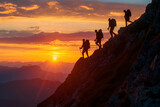 Fototapeta Góry - Hikers on a Ridge Overlooking Sunset