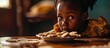 African child girl hiding and looking chocolate cookies or biscuits on dish from under the table. Copy space image. Place for adding text