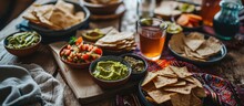 A Tablecloth With Geometric Patterns And Elegant Leaves Decorates The Table Where Two Bowls Of Hummus And Guacamole Are Served With Whole Wheat Toast And Breadsticks A Healthy And Delicious Sna