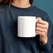 © ChubbyCat - Closeup of female hands with a white mug of beverage. Cup Mockup