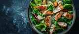 A delicious chicken caesar salad with parmesan cheese dressing and croutons. Copy space image. Place for adding text