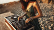 Young attractive DJ girl playing music on DJ decks