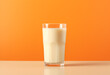 Glass of milk on table front view