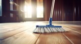 Fototapeta Pokój dzieciecy - brooming a hardwood floor with white broom