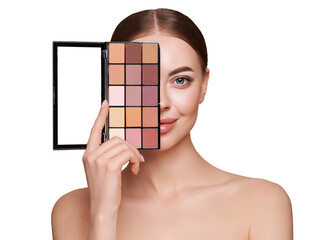 Wall Mural - beauty woman with eye shadow makeup palette. model with healthy perfect skin, close up portrait. cos