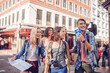 © Marko Geber - Diverse group of young friends exploring the city