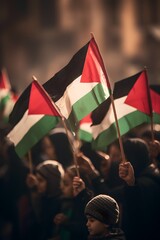 A group of people holding flags of the palestine