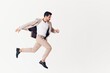 © SHOTPRIME STUDIO - happy man suit beige person businessman smiling victory running winner business